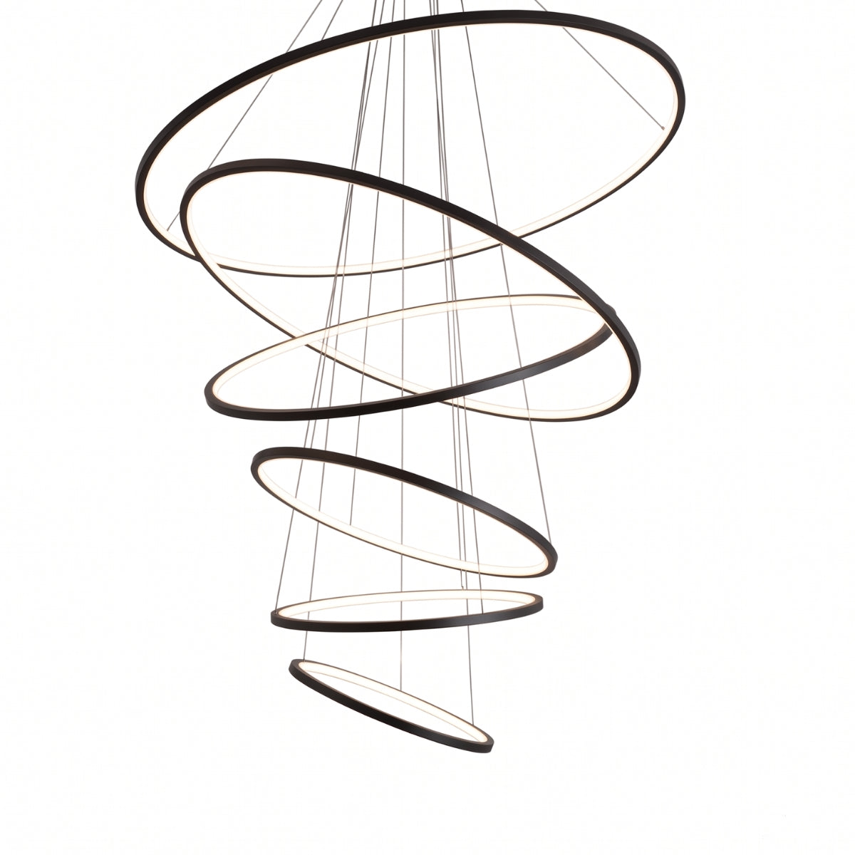 A modern spiral chandelier with multiple concentric rings in a dark finish, suspended by thin cables against a plain white background.