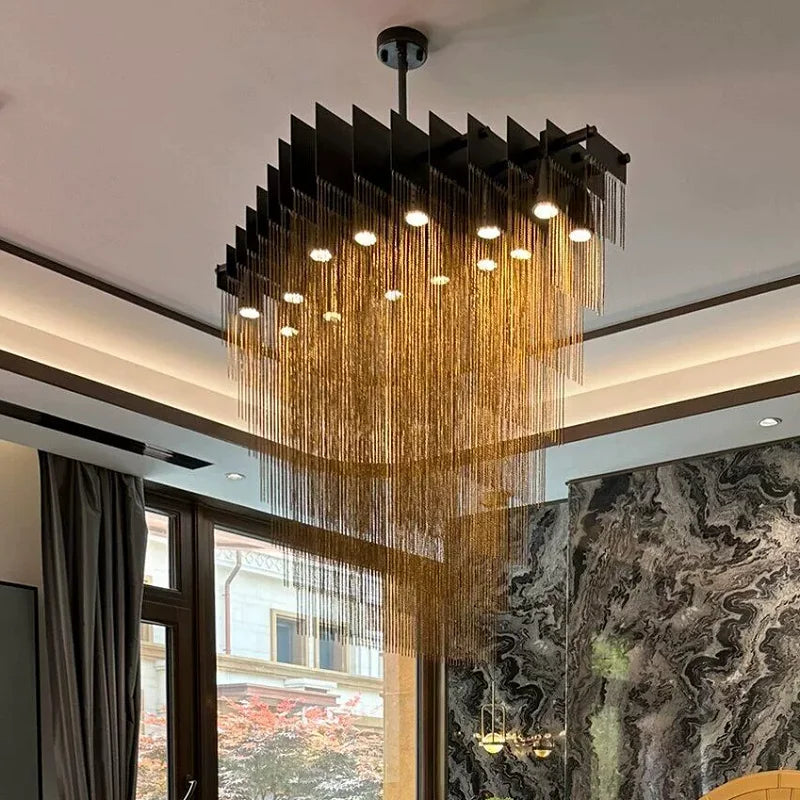 Tessaro modern luxury chandelier with Italian designer chain tassels in black and gold finish for living room or hotel interiors