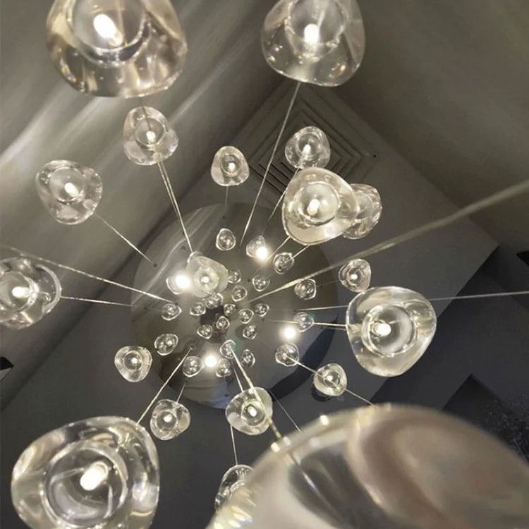 Lustra Vela modern crystal chandelier with chrome finish and transparent glass drops—Scandinavian semi-flush ceiling light for living rooms, dining areas, and entryways.