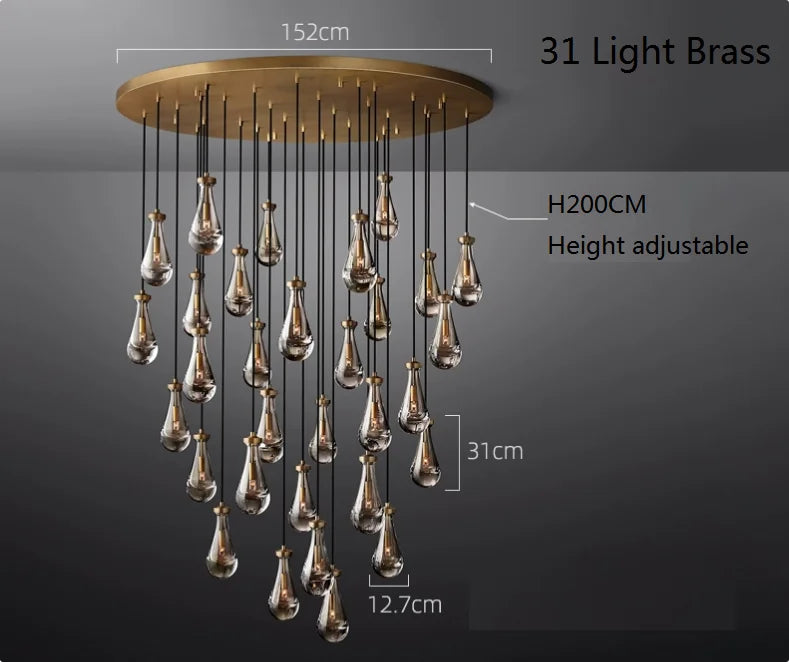 Raine Modern Chandelier with K9 crystal prisms and sleek metal design, perfect for high-ceiling living rooms, foyers, and upscale interiors. Adjustable height, energy-efficient LED compatible.