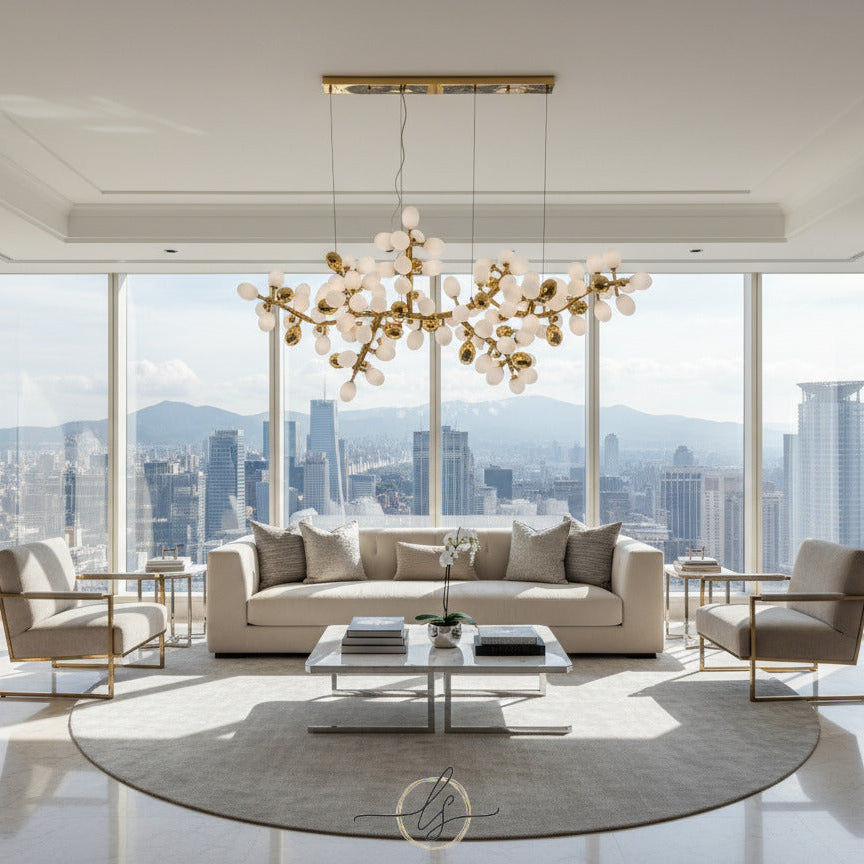 Contemporary statement chandelier with white glass sphere clusters and French Gold finish, ideal for luxury dining rooms, living spaces, and hallways.
