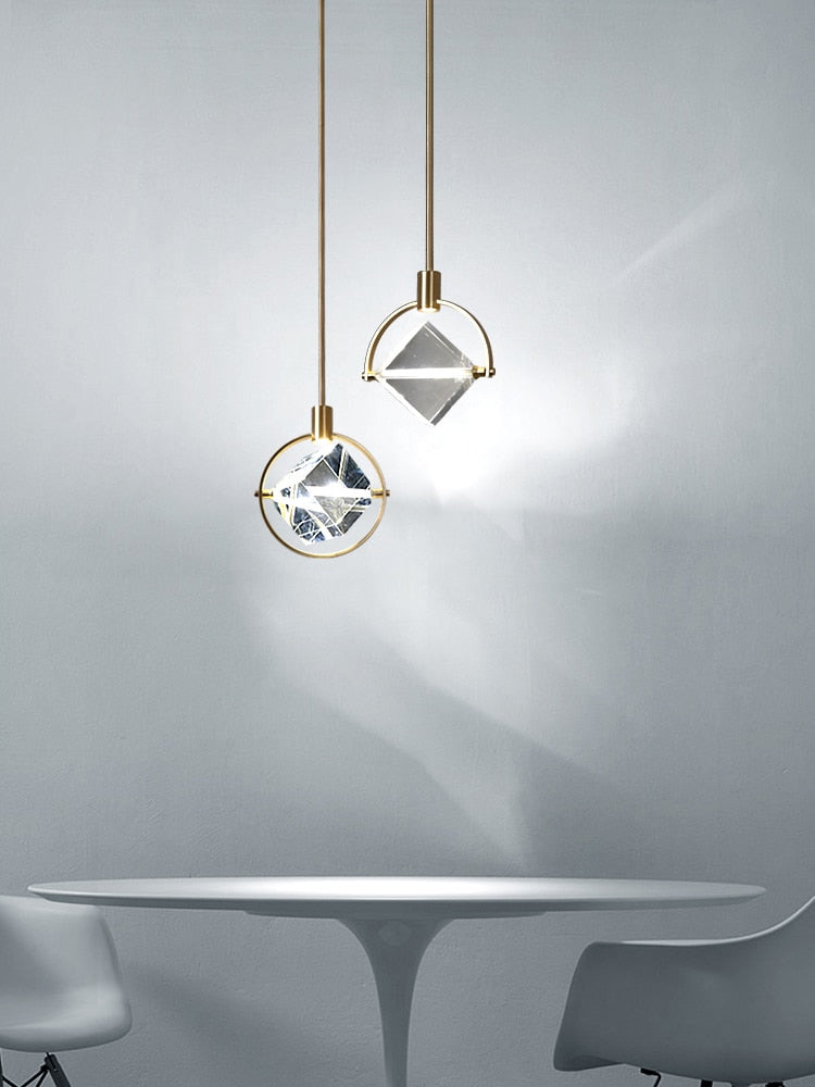 Lights of Scandinavia - Kimberlite - Outstanding luxury pendant light. Clean design, polished steel body combined with a large crystal that really makes the light pop. Applicable for living rooms, kitchens, bedrooms, dining rooms, cafés, etc. Dimensions Diameter 20cm Height 50cm + 50cm hanging rod. Two variants available; Open and Closed  Modern LED Crystal Chandelier kitchen bar Pendant lamps Bedroom bedside decor lighting Dining room Hanging lights  Specifications Light Source LED Bulb Base Type 2G11