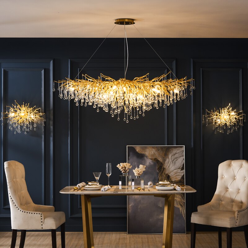 Lights of Scandinavia - ooze - "-What on earth is that majestic being hanging from the ceiling?"  Majestic crystal chandelier. Unique lighting for dining rooms, living areas, entrance halls, hotel areas, restaurants, etc.    K9 crystals with silver/gold metal plated aluminum frame. - A work of art.  2 sizes - 2 colors L120cm: L120xW50xH35cm, 12-25m2 L160cm: L160xW55xH35cm, 16kg, 15-30m2
