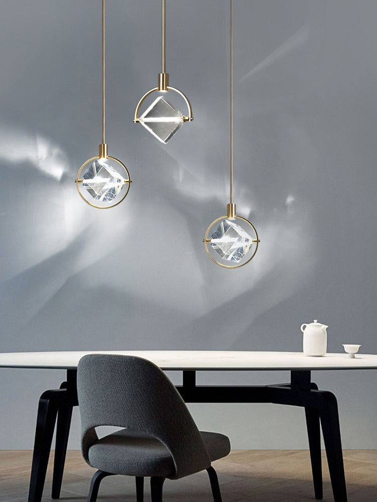 Lights of Scandinavia - Kimberlite - Outstanding luxury pendant light. Clean design, polished steel body combined with a large crystal that really makes the light pop. Applicable for living rooms, kitchens, bedrooms, dining rooms, cafés, etc. Dimensions Diameter 20cm Height 50cm + 50cm hanging rod. Two variants available; Open and Closed  Modern LED Crystal Chandelier kitchen bar Pendant lamps Bedroom bedside decor lighting Dining room Hanging lights  Specifications Light Source LED Bulb Base Type 2G11