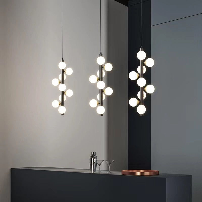 Lights of Scandinavia - Molekyl - Transform your living space into a modern, inviting ambiance with Molekyl's simple LED Chandelier. This sleek, contemporary design is perfect for any interior, from a grand staircase to a cozy bedroom. Its unique polished copper finish will add both style and illumination to any room in your home.